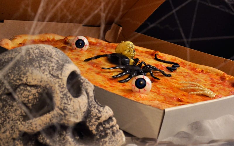 spooky pizza with skull and spider